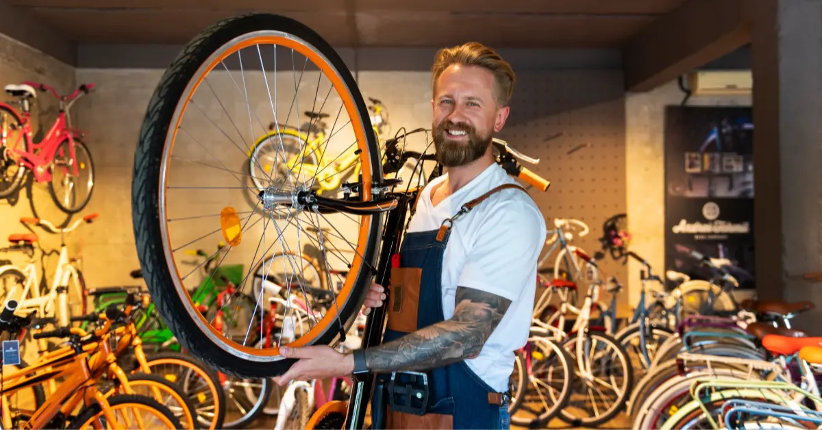young businessman in bike shop