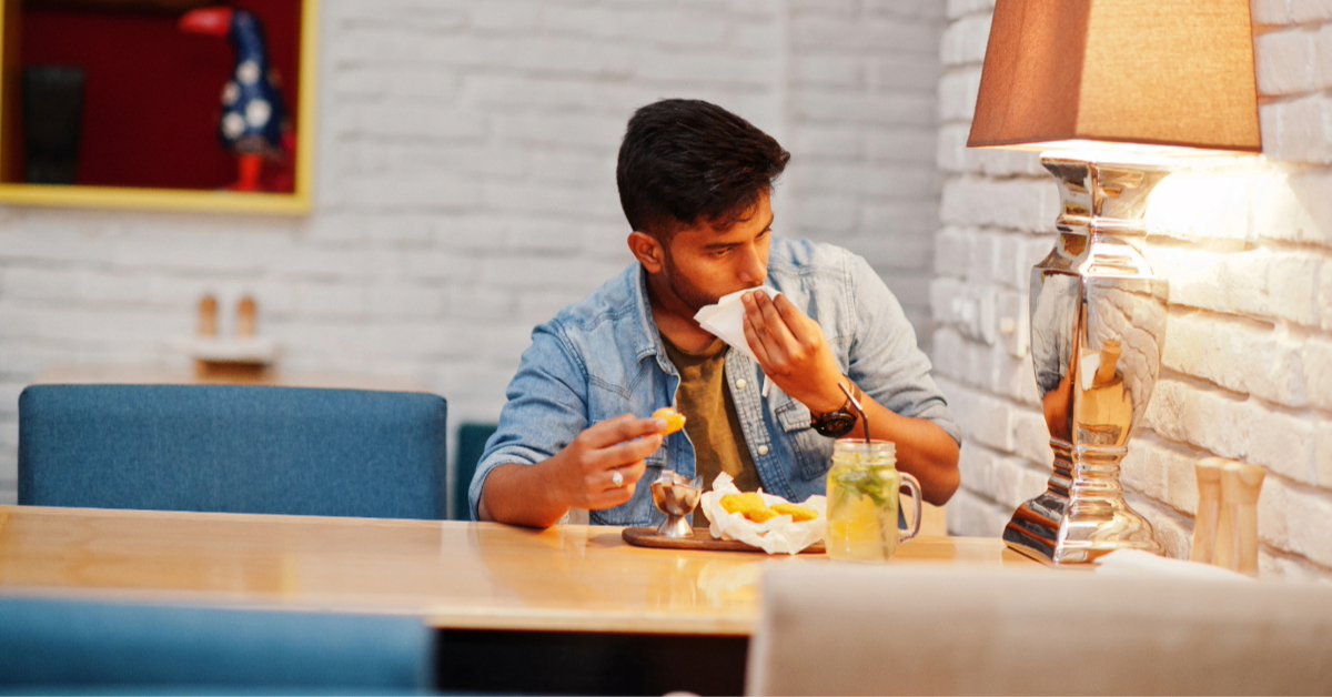 someone eating in a considerate way