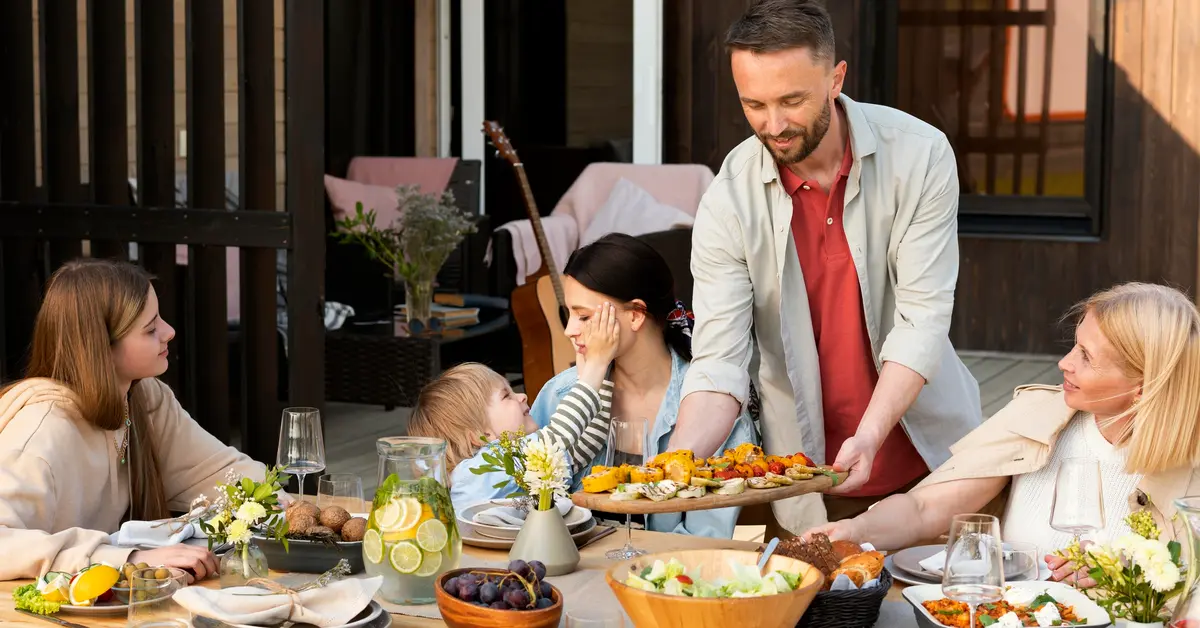 A family enjoying food outdoors