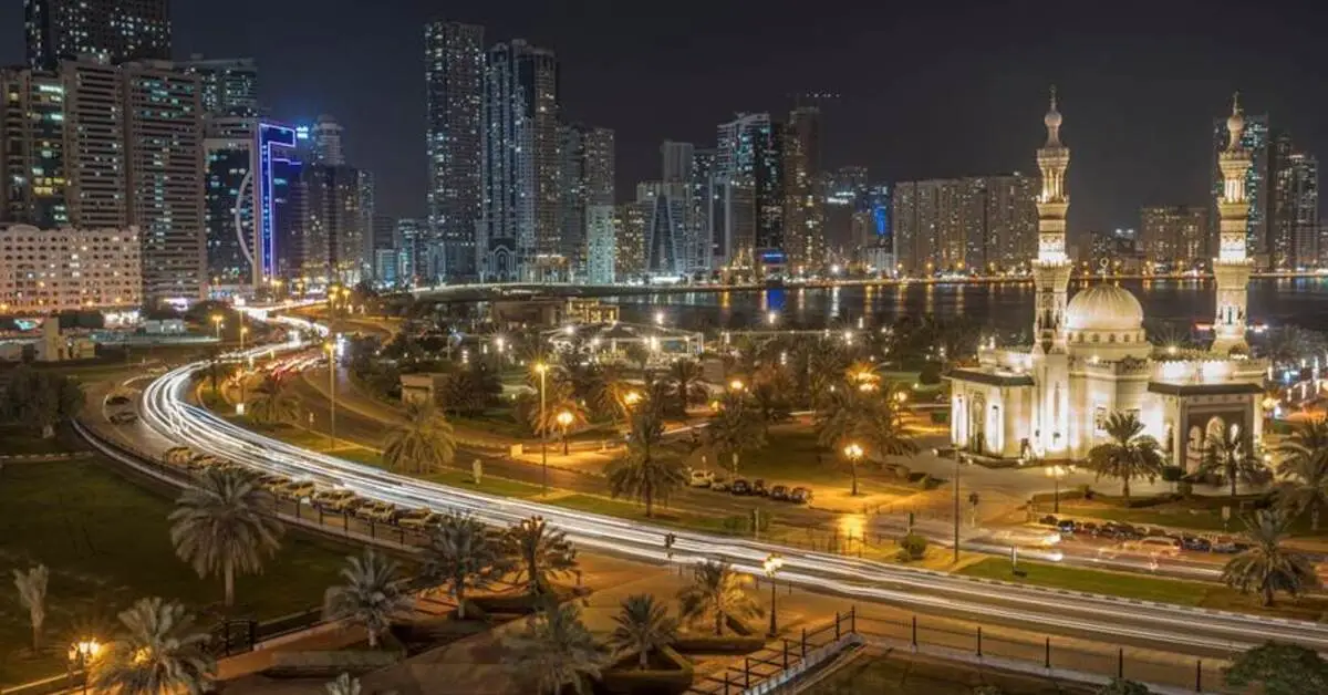An illuminated mosque in Sharjah at night time