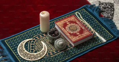 A prayer carpet with Quran on top of it and dates