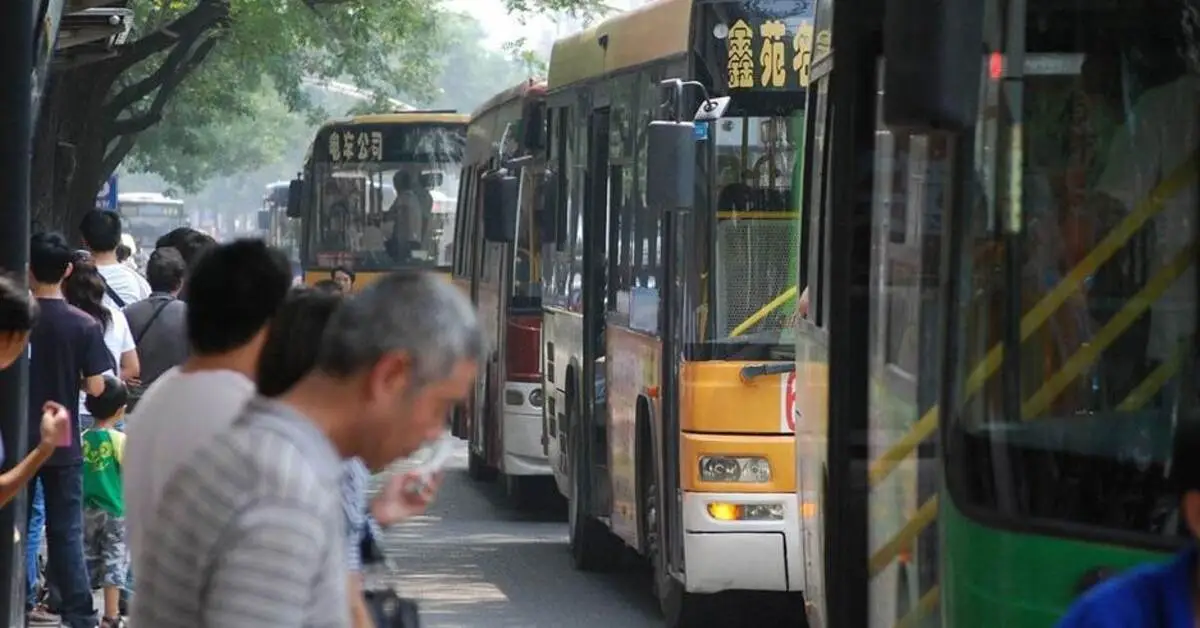People waiting for buses at the Al Qusais bus station