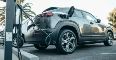 Electric car parked on a charging bay
