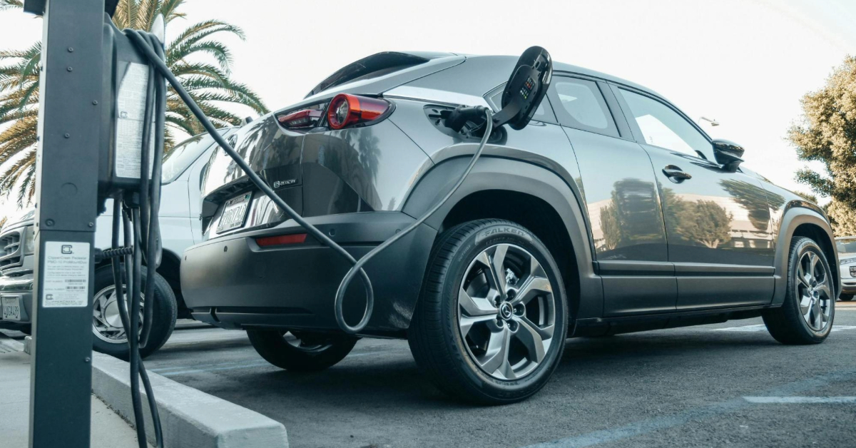 Electric car parked on a charging bay