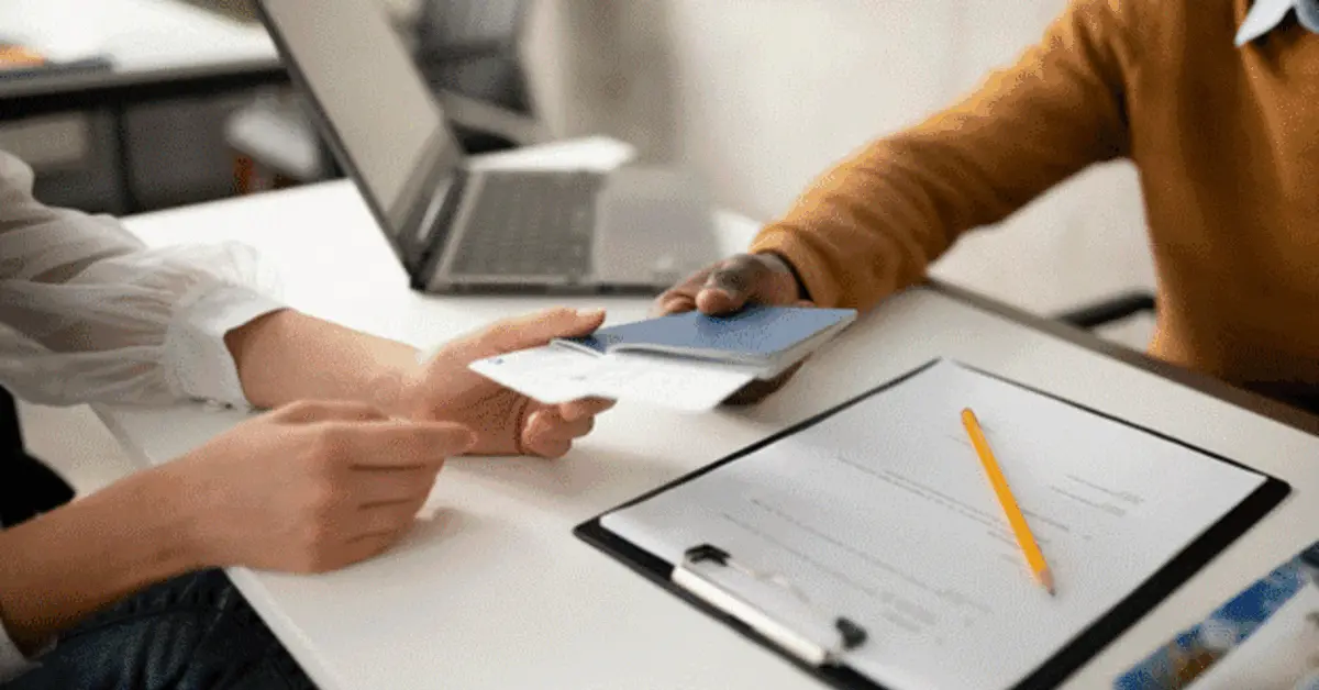 submitting her documents in-person for Emirates ID renewal