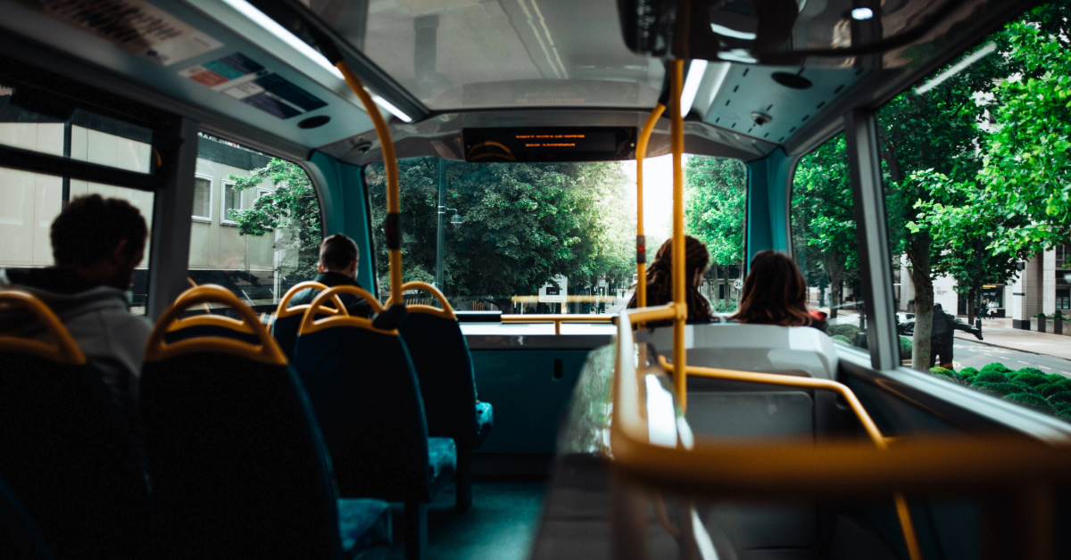 People sitting inside the F02 bus