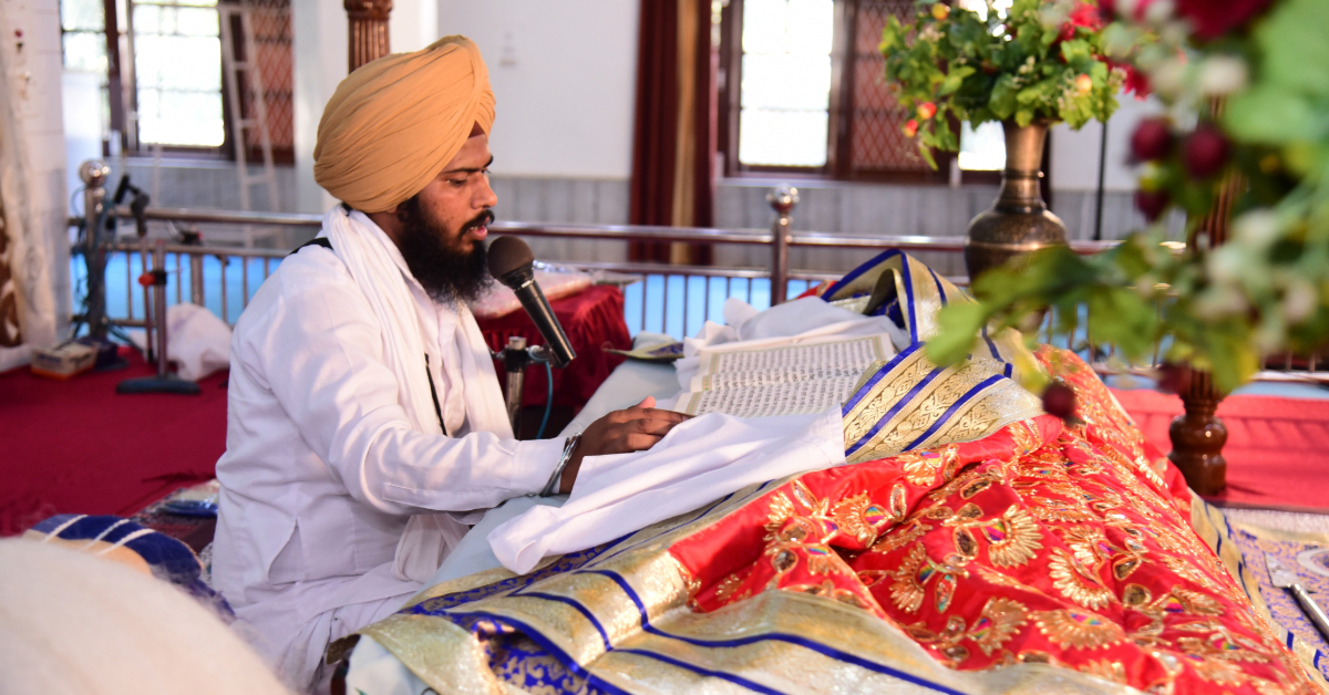 A Sikh reciting prayer at a gurudwara in Abu Dhabi