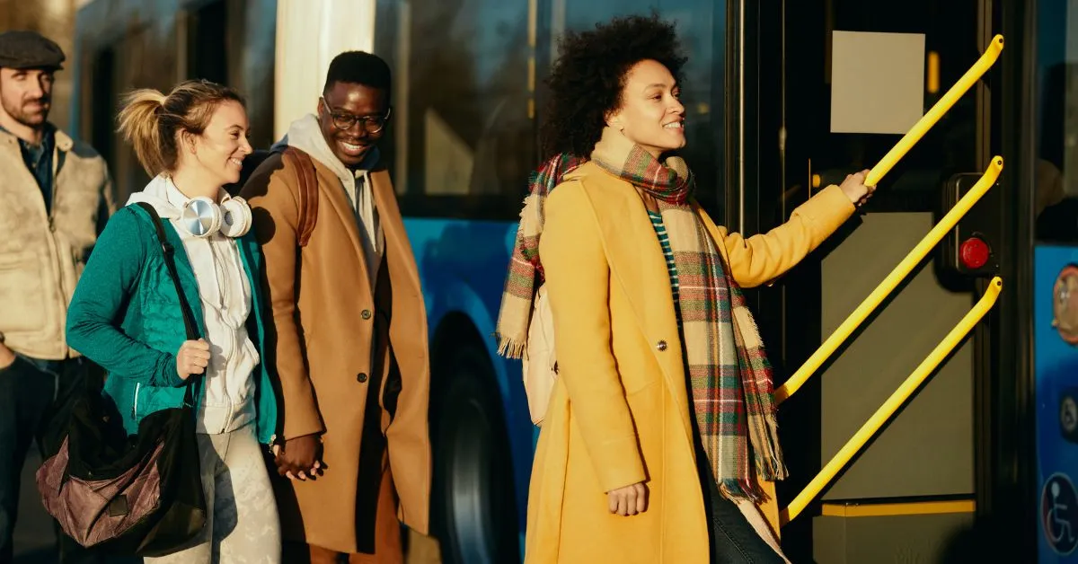 People waiting patiently to board the bus.&nbsp;