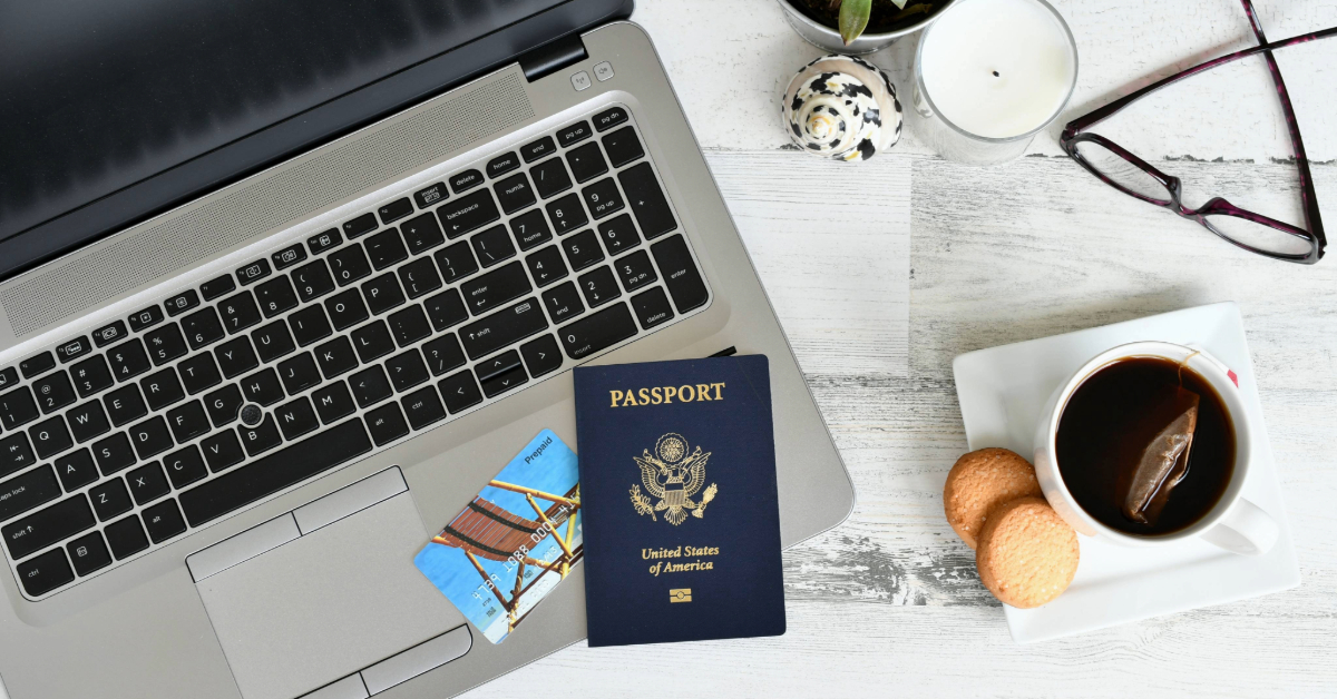 Preparing to apply for an e-Visa. Laptop and passport