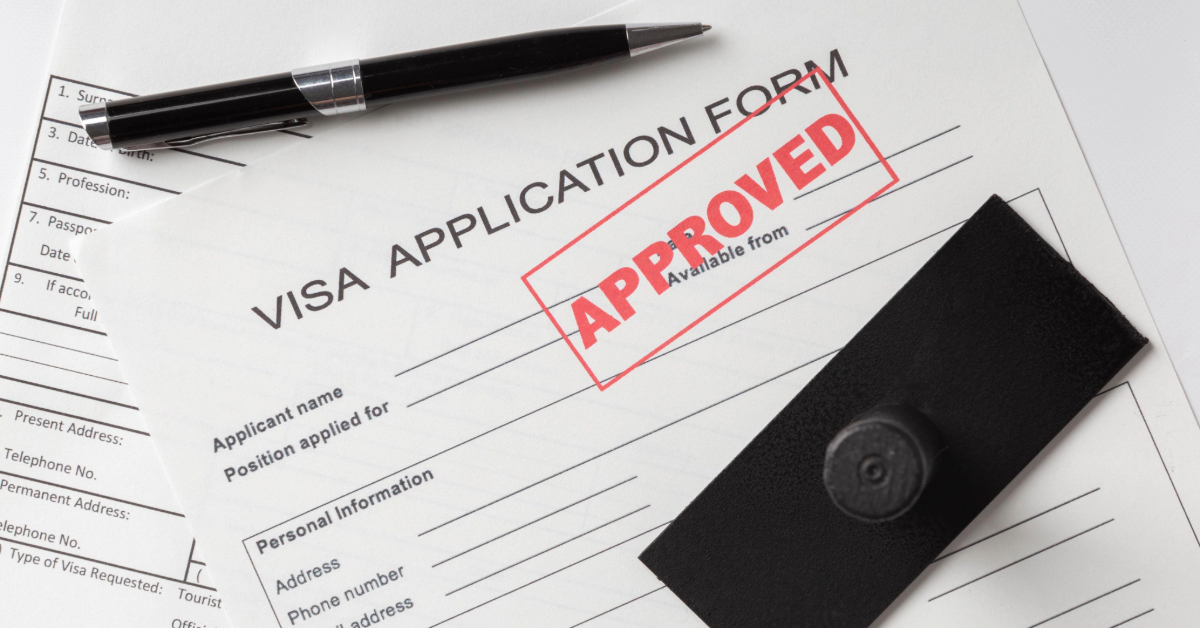 An approved stamp on a visa application form