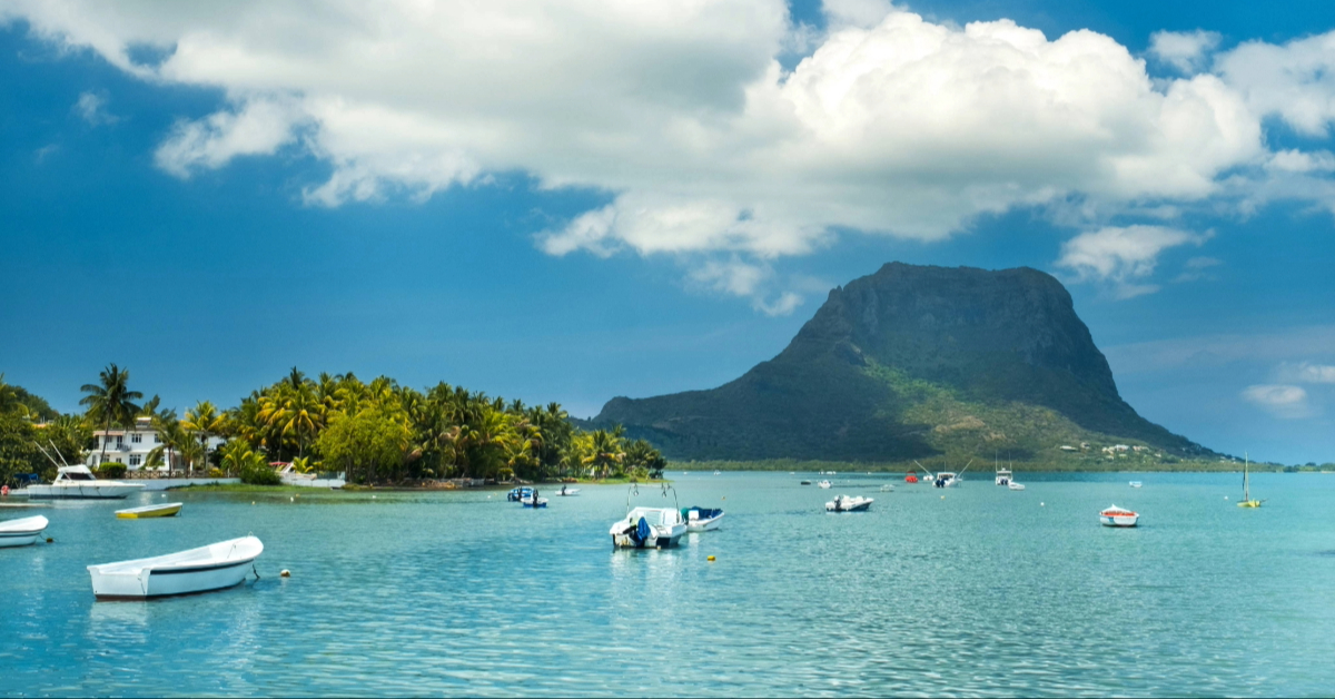 View of the mountain with boats on the island of Mauritius