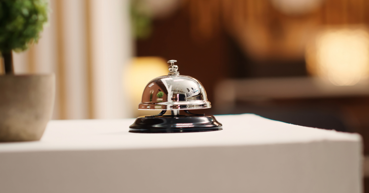 A close-up shot of the front desk bell
