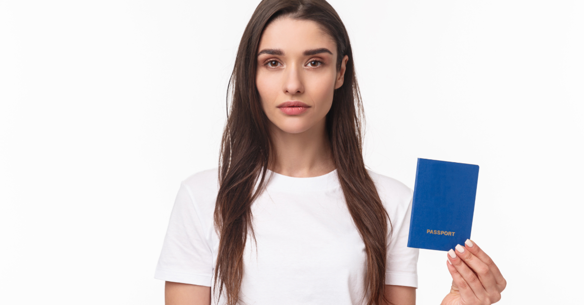 a lady holding a passport