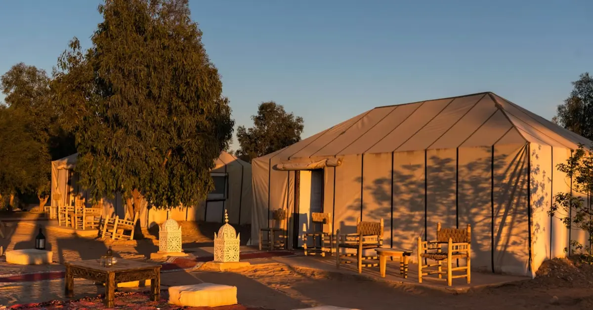 A luxury tent set against the desert landscape