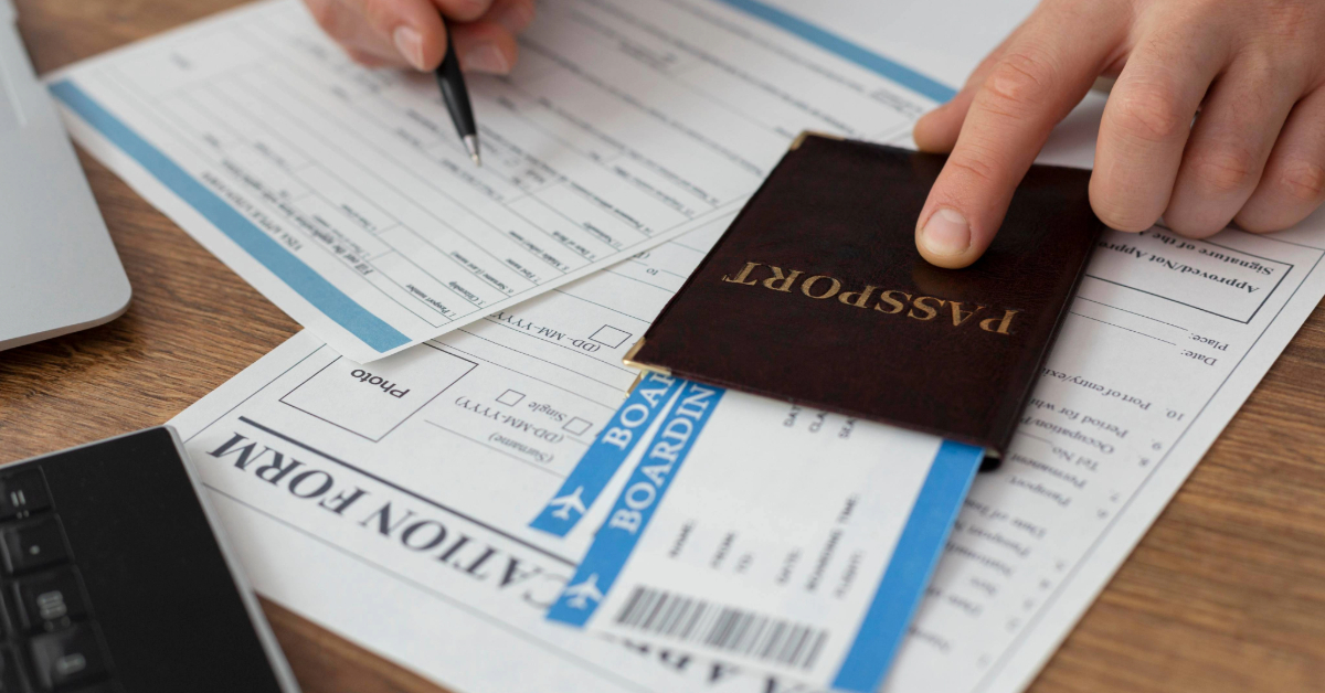 A person filling out the visa form physically
