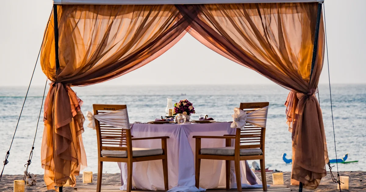Romantic dinner setting on the beach