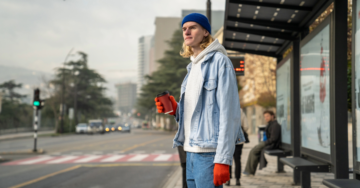 College student waiting for the bus