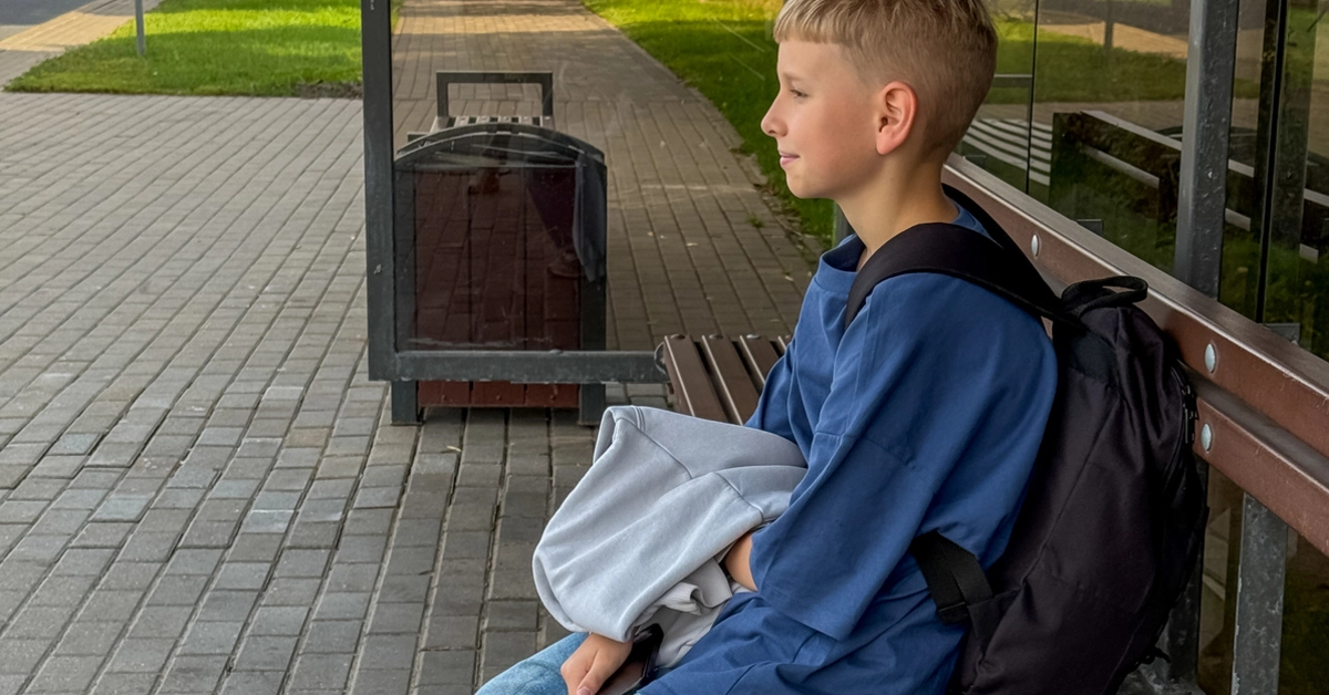 student waiting for the bus