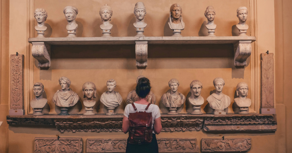 A woman watching relics inside a Museum