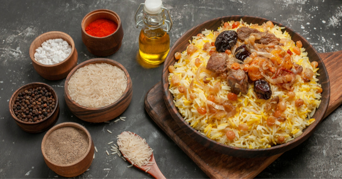 Biriyani placed beside a variety of spices