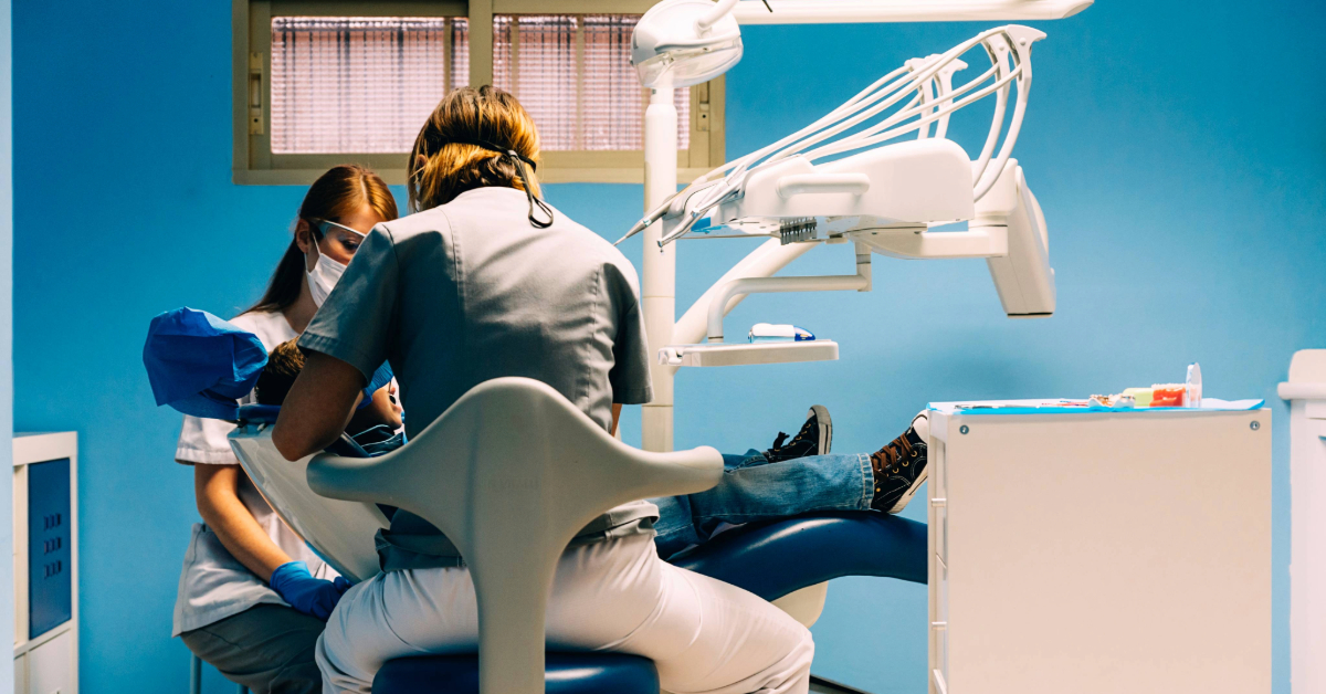Dentists with a patient during a dental treatment