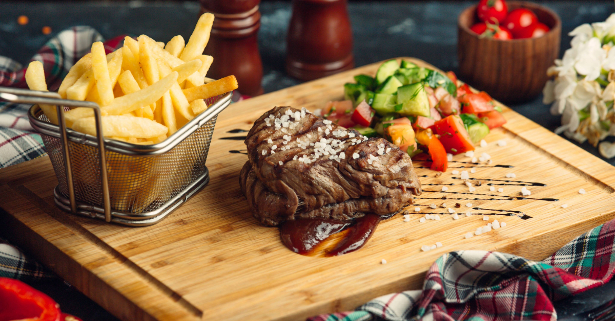 Steak served with fries at a restaurant in Mussafah