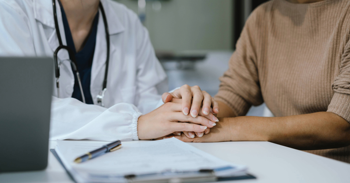 doctor consulting patient in clinic