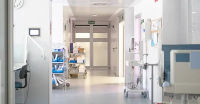 hospital corridor with medical equipment and supplies