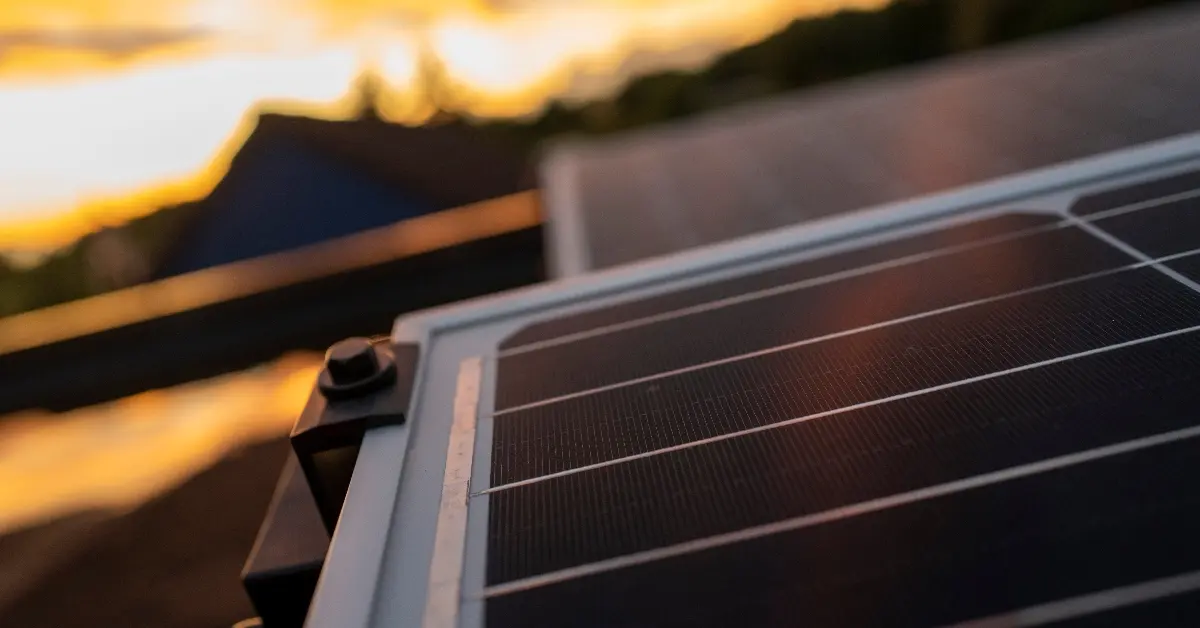 solar panel on a roof during sunset