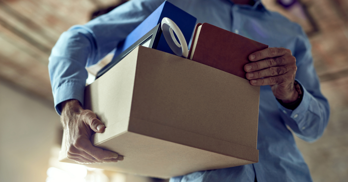 A tenant leaving with their things in a box after getting an eviction notice