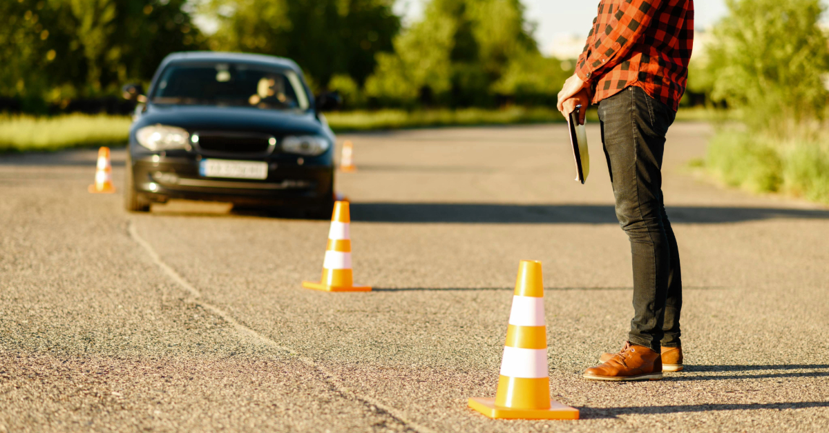 people taking training in driving a car