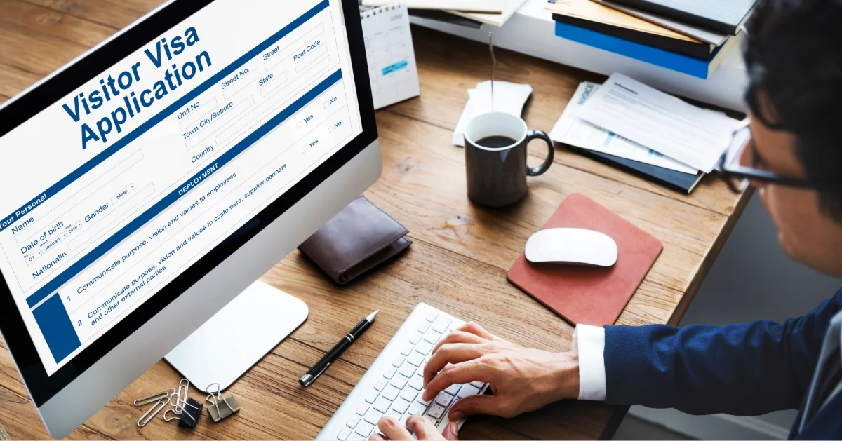 A man filling out his Czech Republic visa application form online