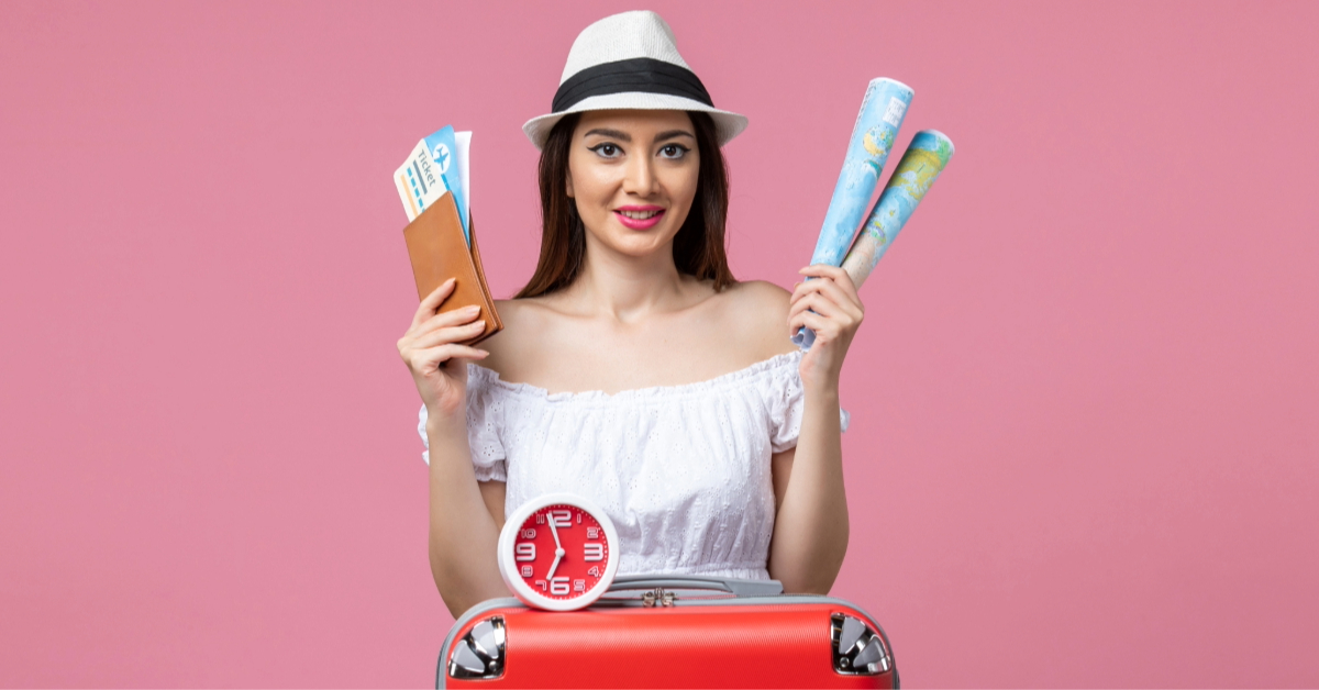 A woman holding Iceland visa in one hand and map in other hand