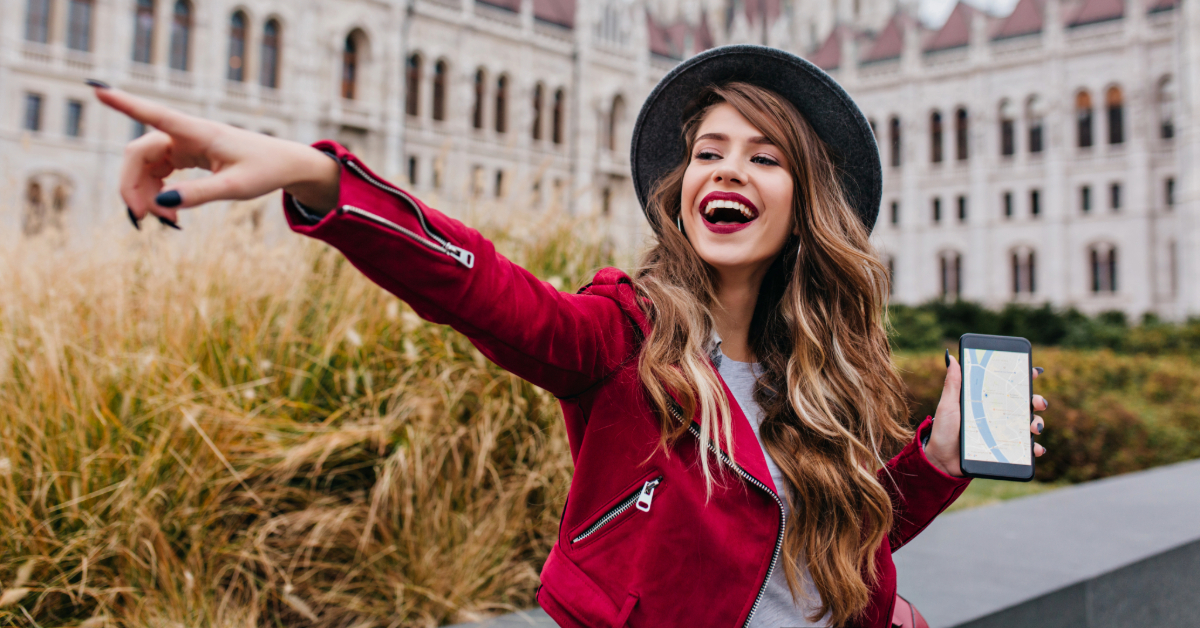 A woman pointing to a nearby sight in Ireland