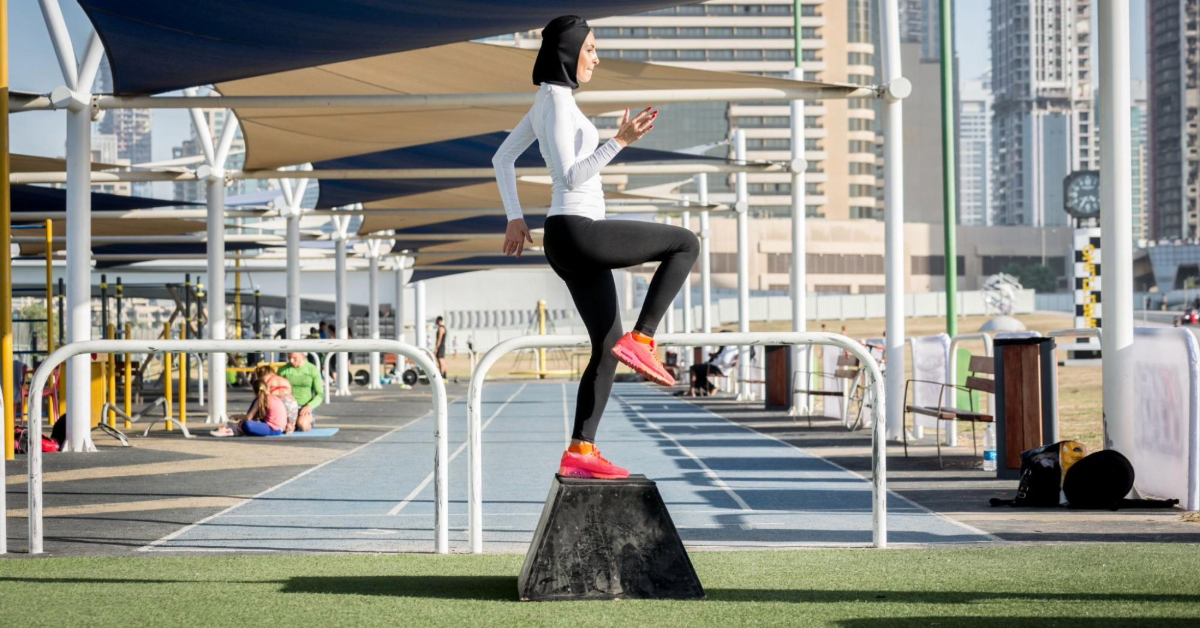 A woman training in a free outdoor gym in Dubai