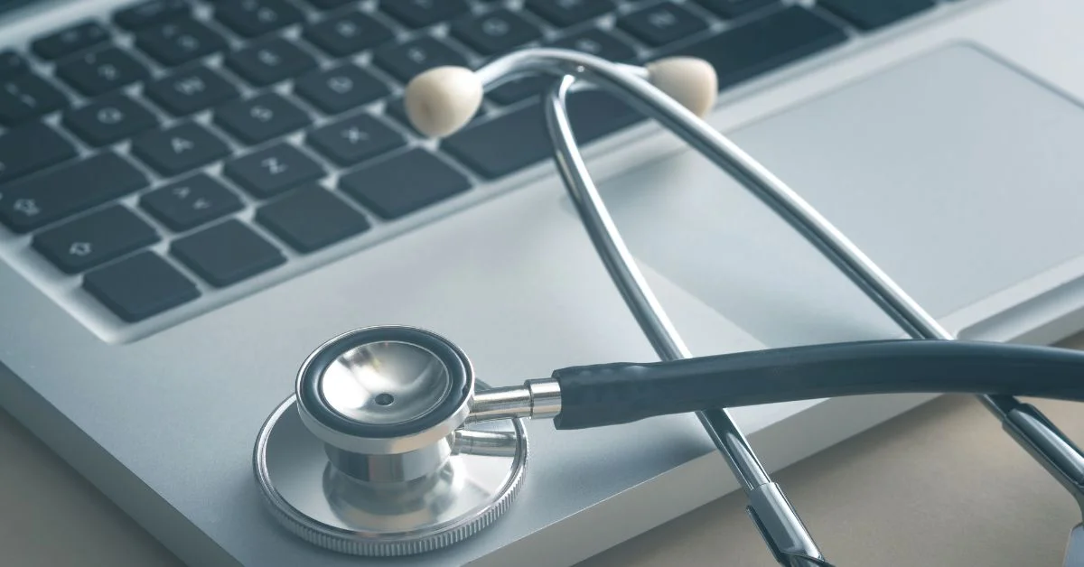 Stethoscope placed on a laptop