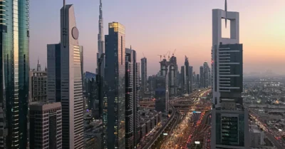 City traffic and skyline buildings