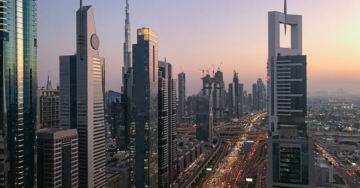 City traffic and skyline buildings