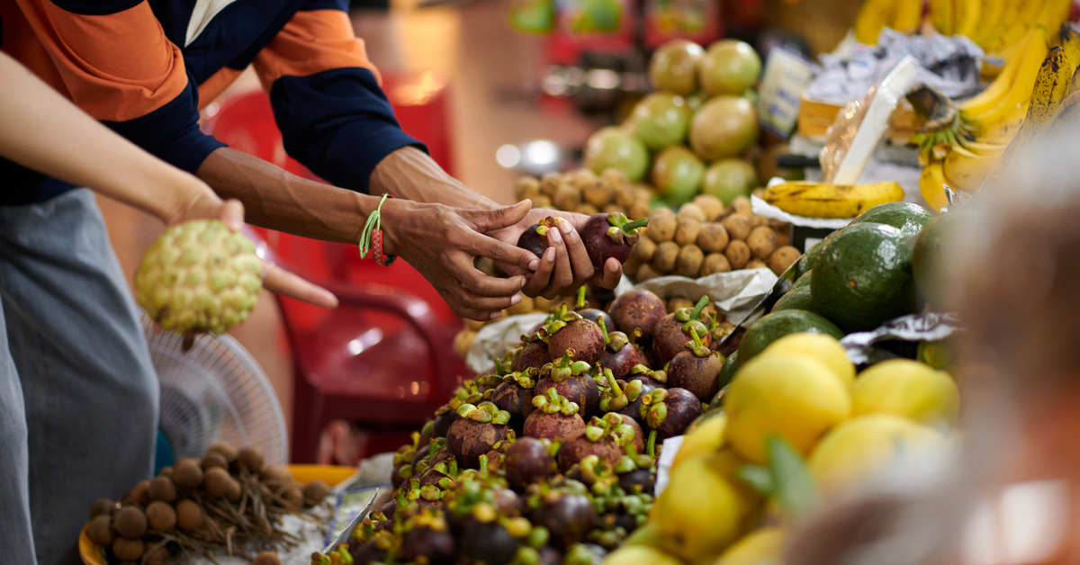 Customer buying fruits
