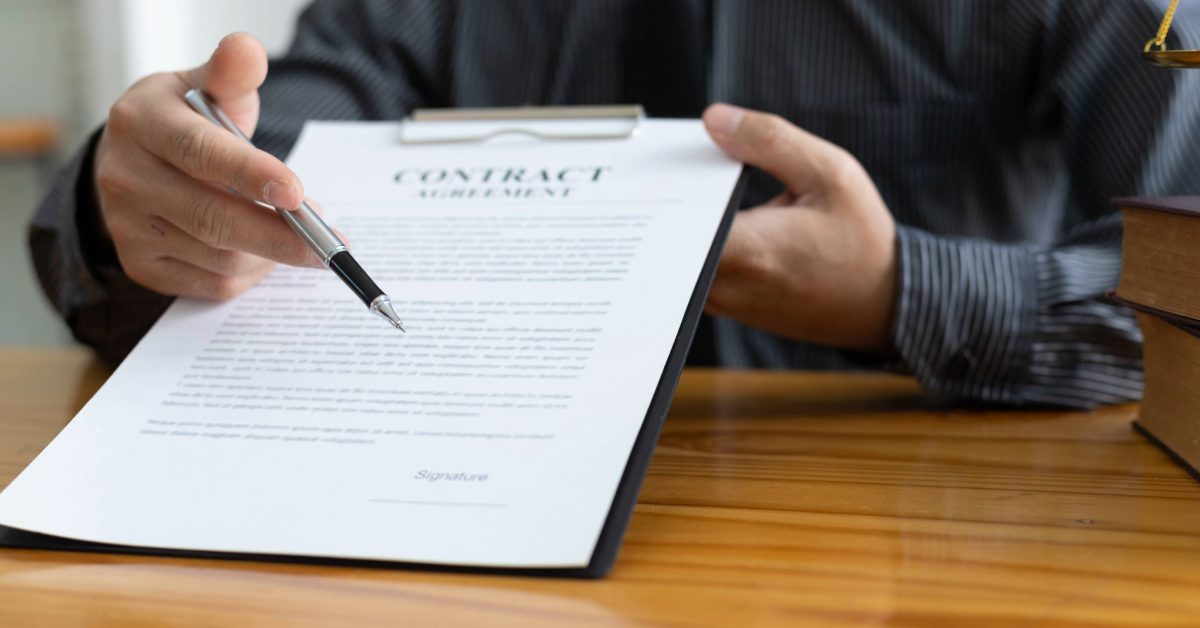 Employee signing an employment contract