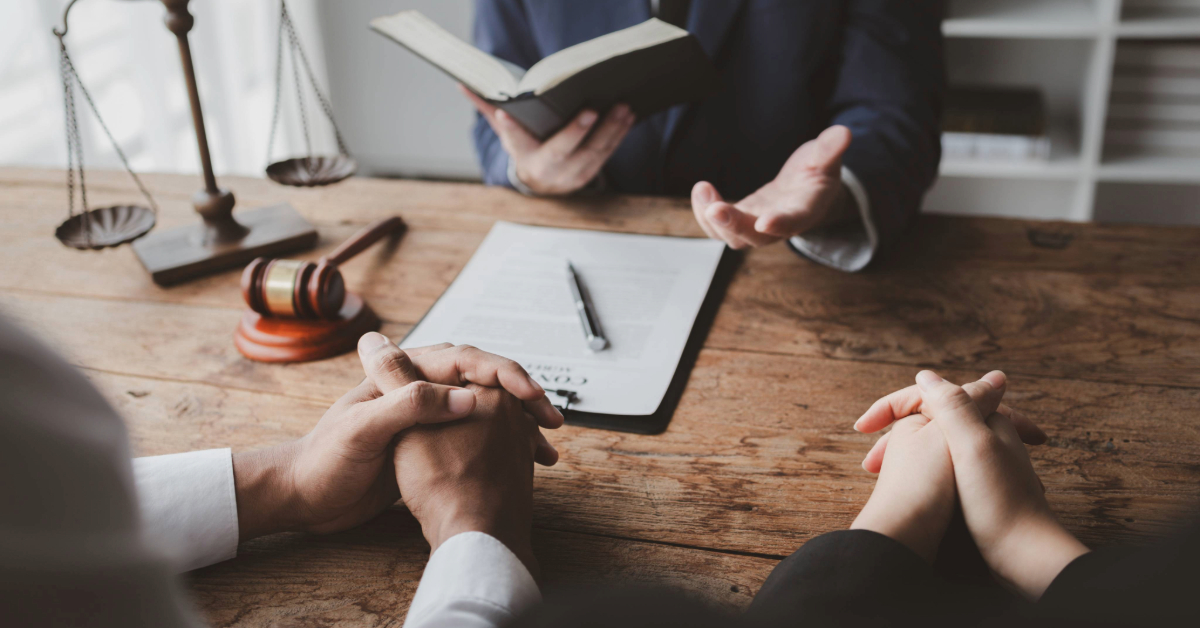 Lawyer consulting couples about divorce