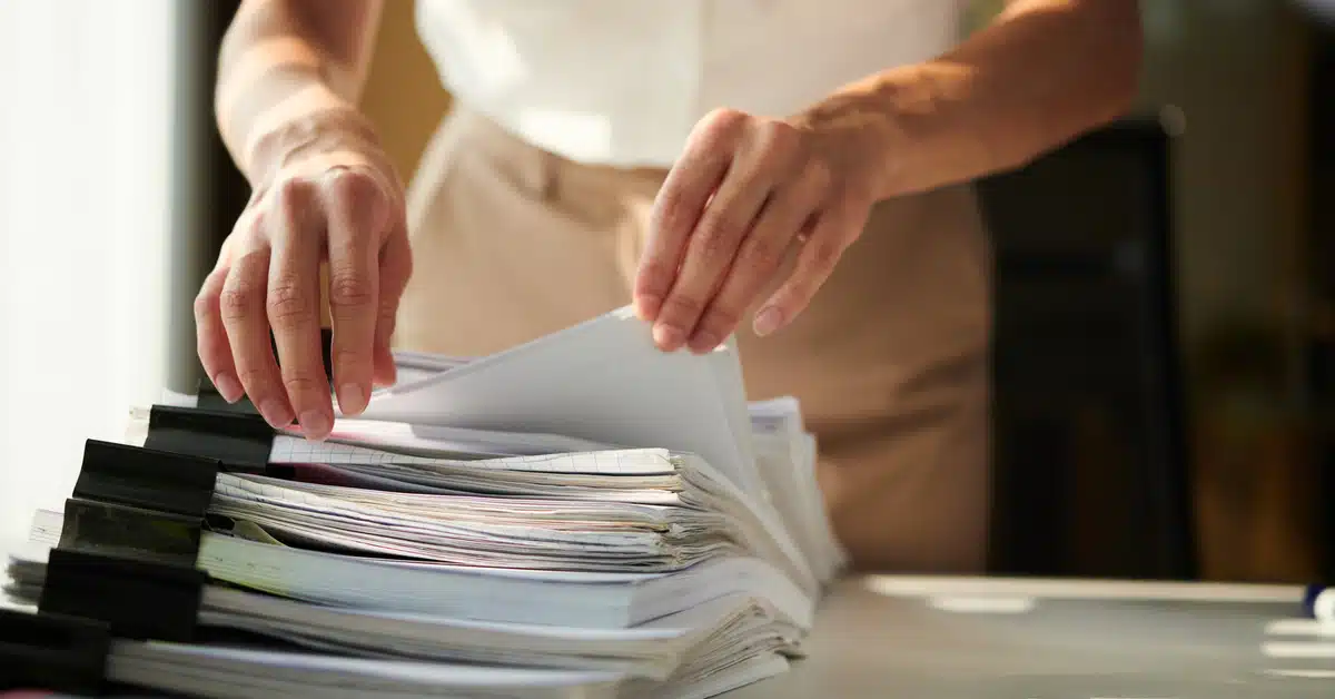 woman checking the required documents