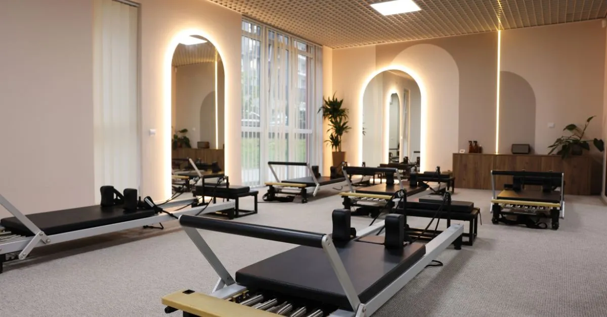 Upscale gym setting with strength training equipment