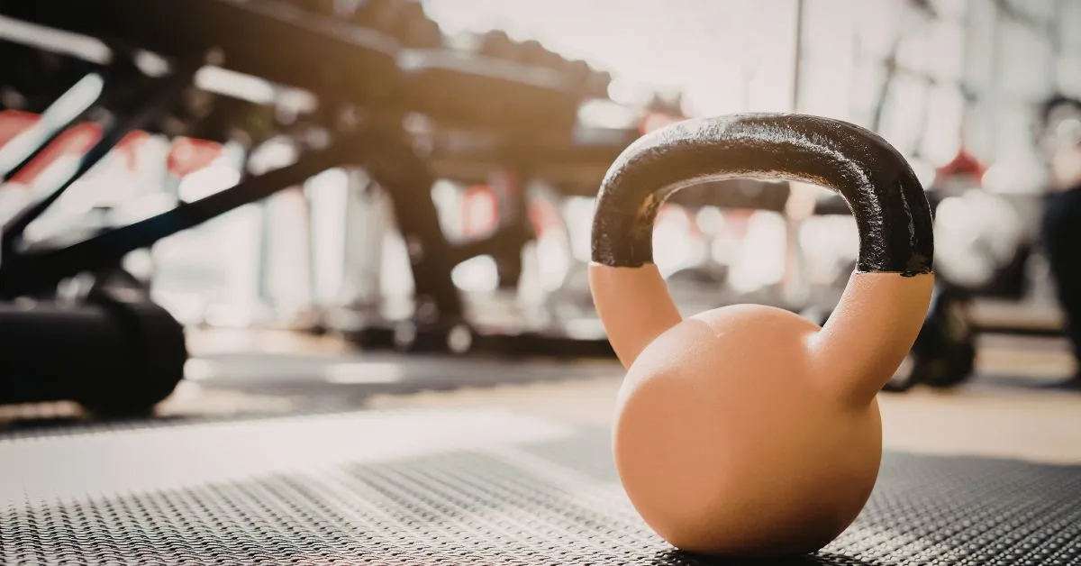 Close-up shot of a kettlebell in a premium fitness studio with natural light