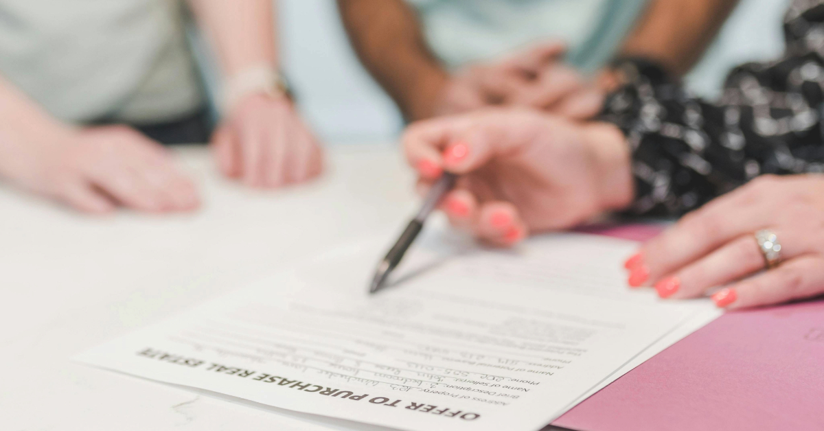 A real estate agent explaining about loan against properties