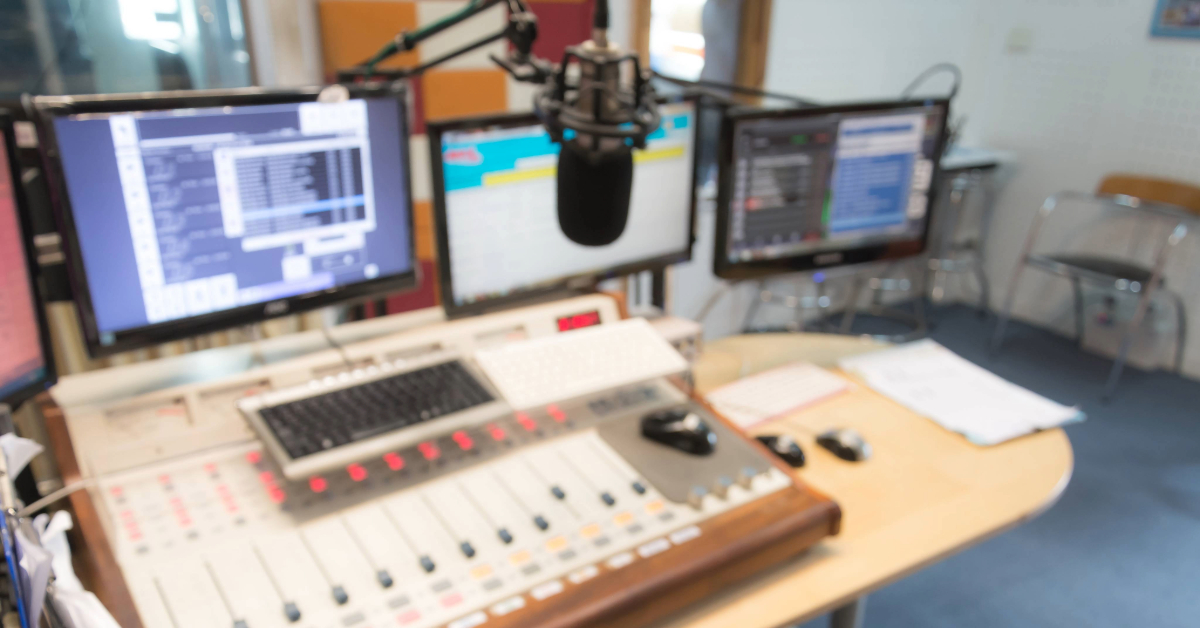 A mic, along with equipment, in a radio station in Abu Dhabi