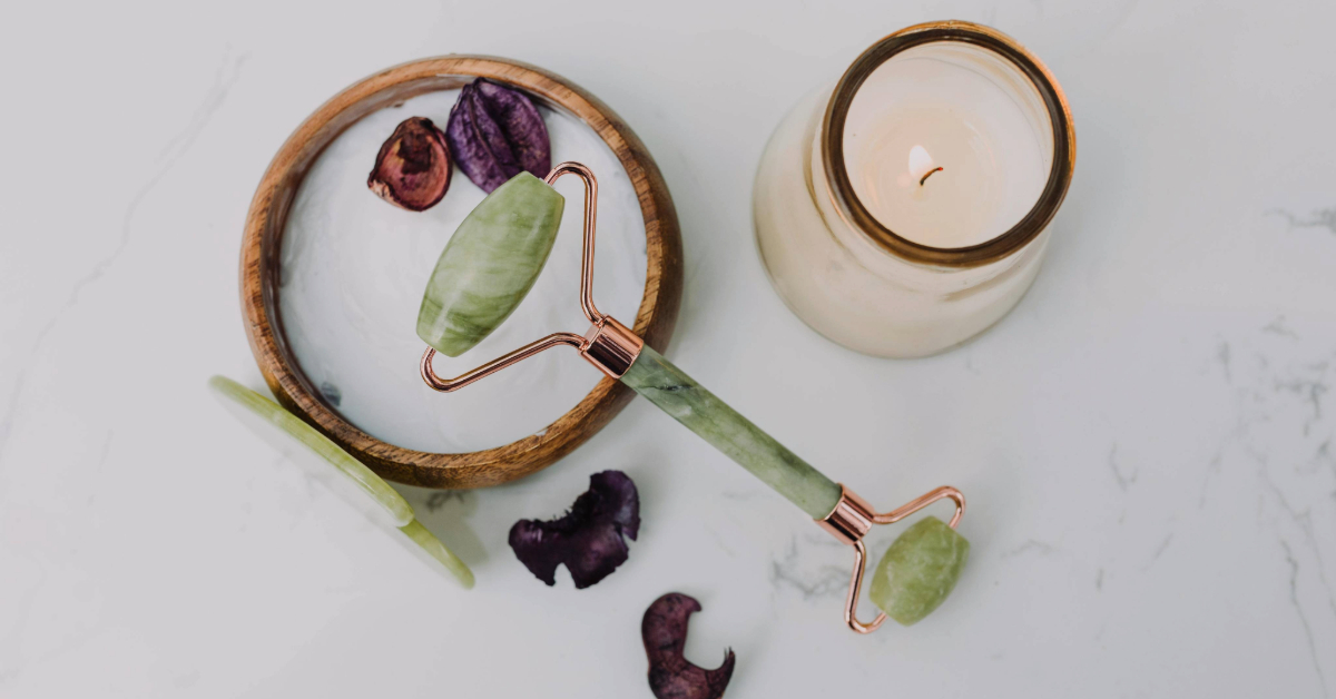 Gua sha and scented candle at a spa