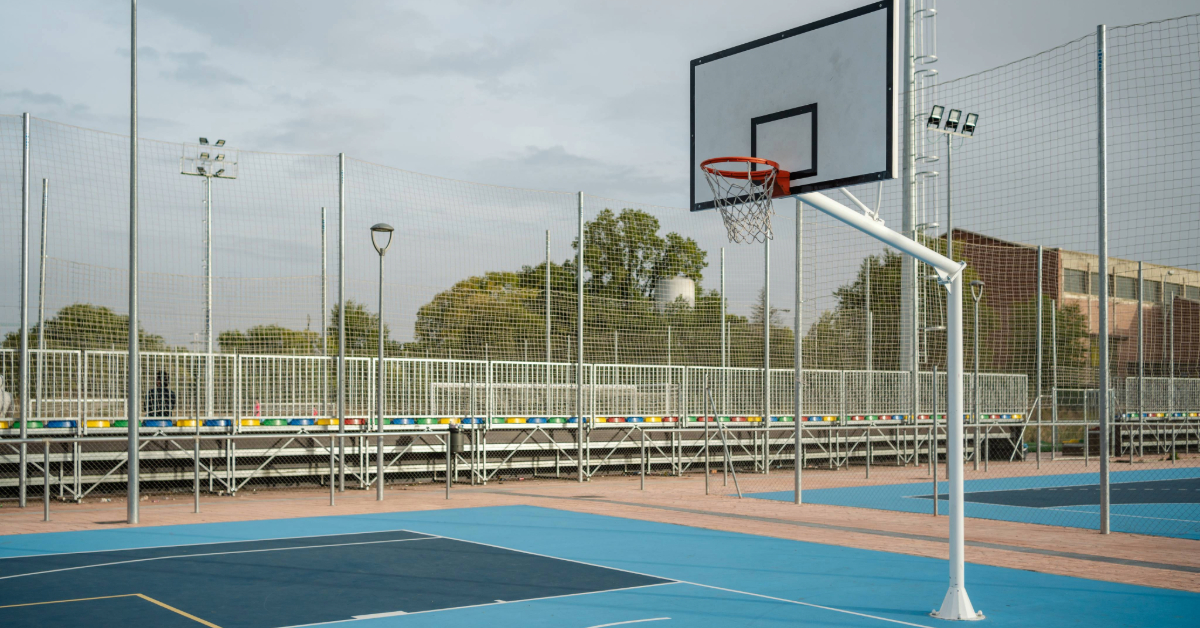 Outdoor basketball court on a sunny day