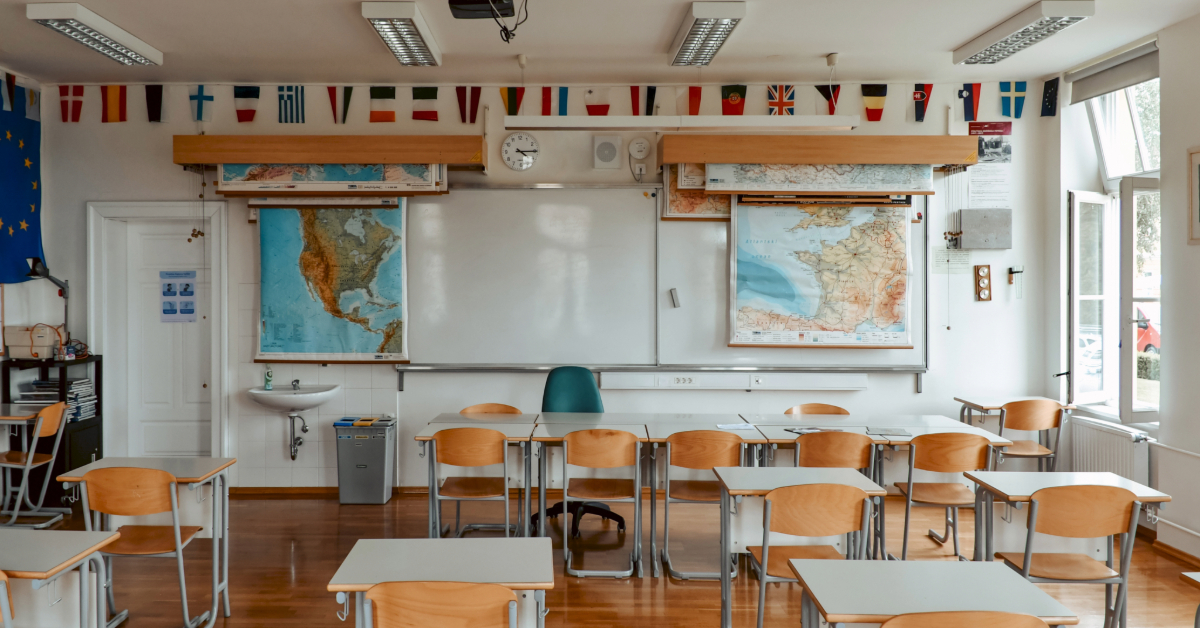 school classroom with white board on wall
