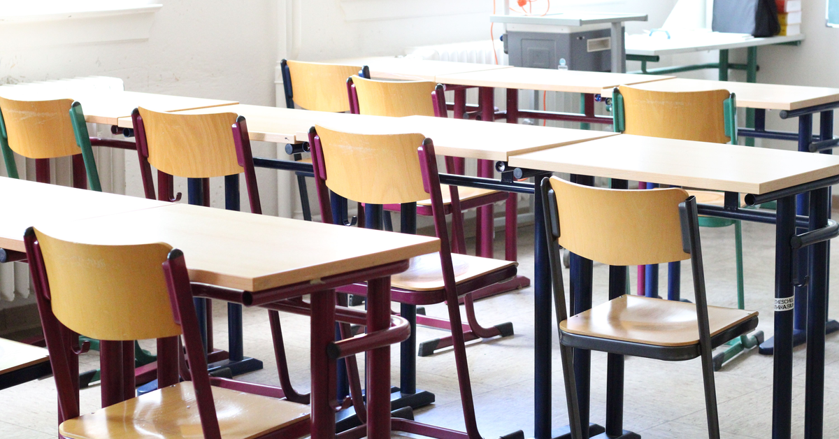 Empty seats in a classroom